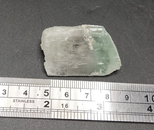 An Aesthetic terminated spodumene floater crystal specimen 22 grams