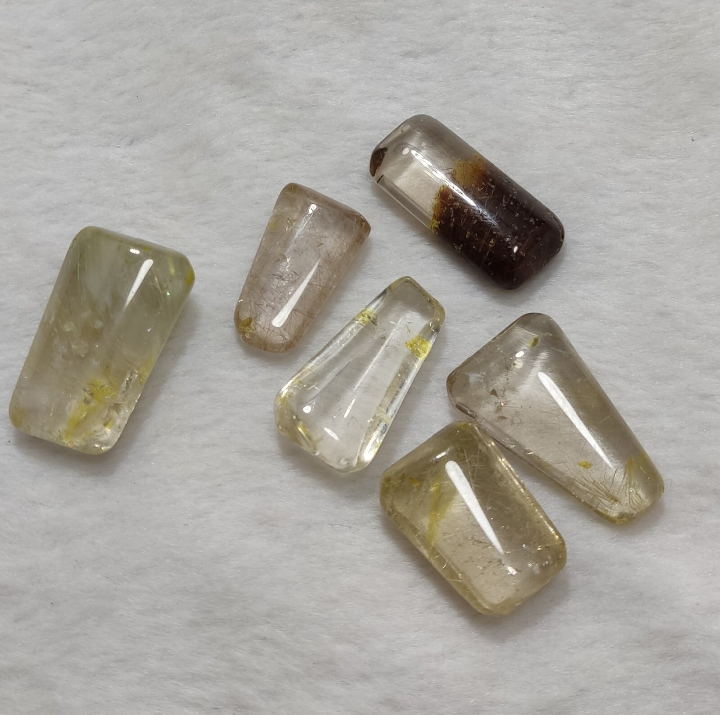 An amazing lot of Rutilated polished quartz tumbles 50 grams
