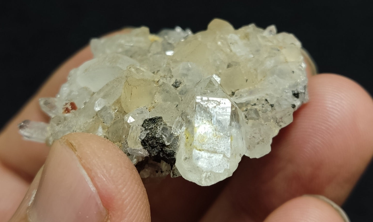 An Aesthetic quartz/calcite crystal specimen with petroleum inclusions 28 grams