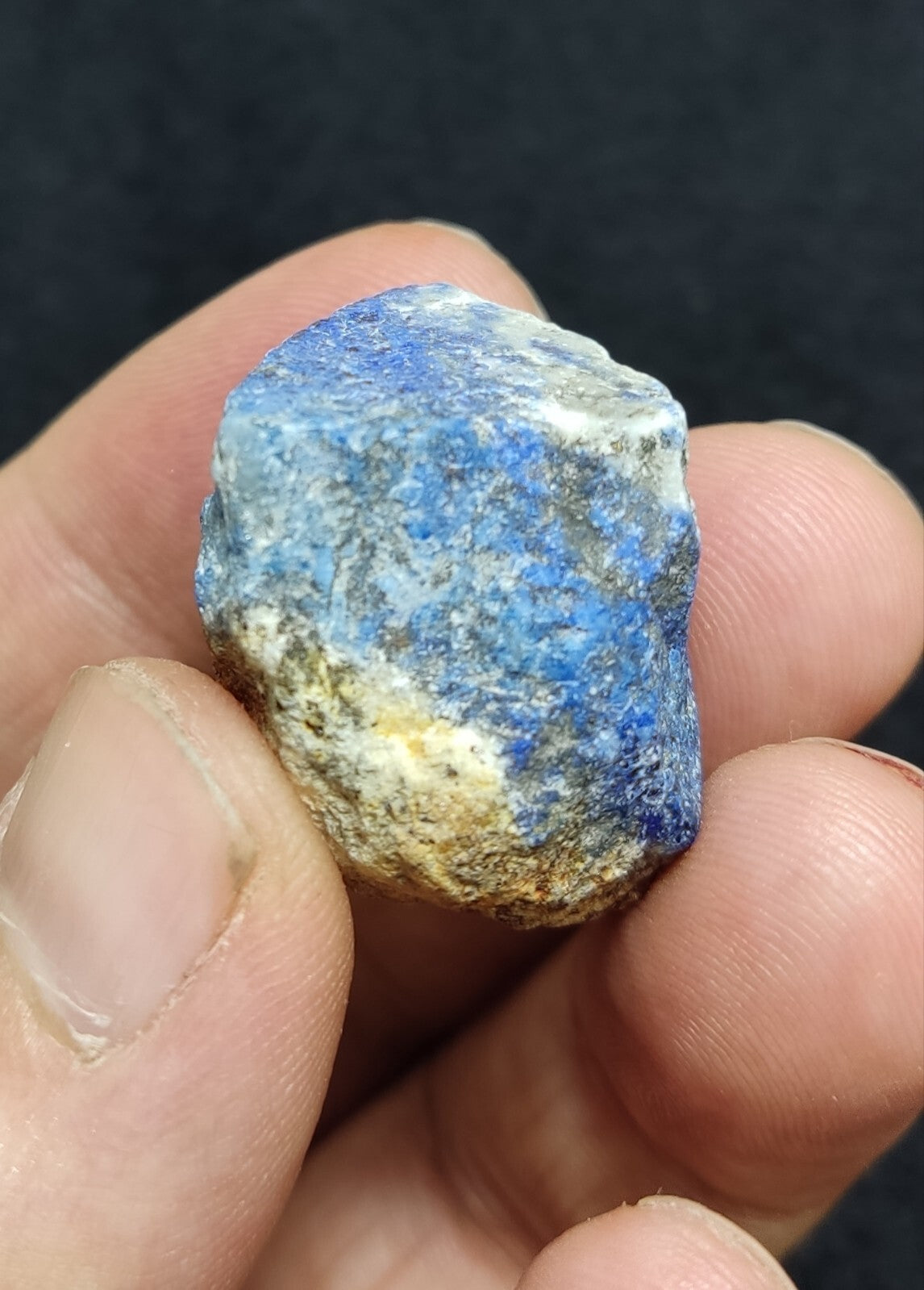 An Aesthetic specimen of fluorescent lapis/lazurite on matrix 23 grams