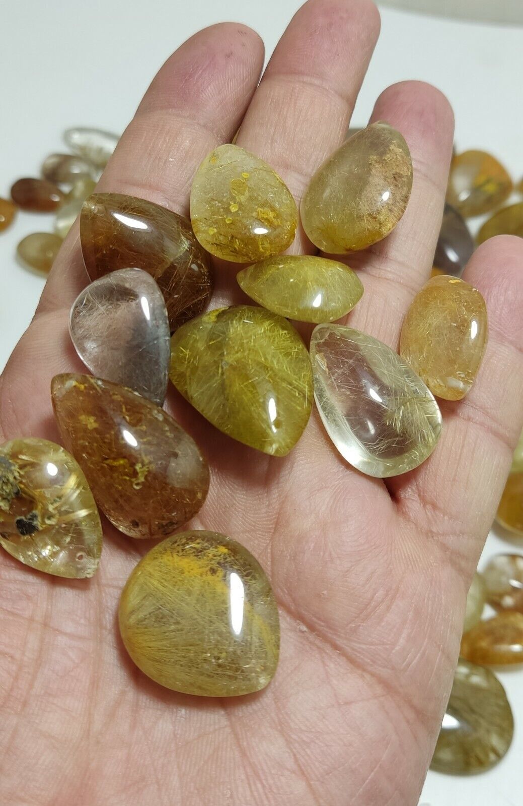 780 grams Rutilated polished quartz tumbles-cabochons