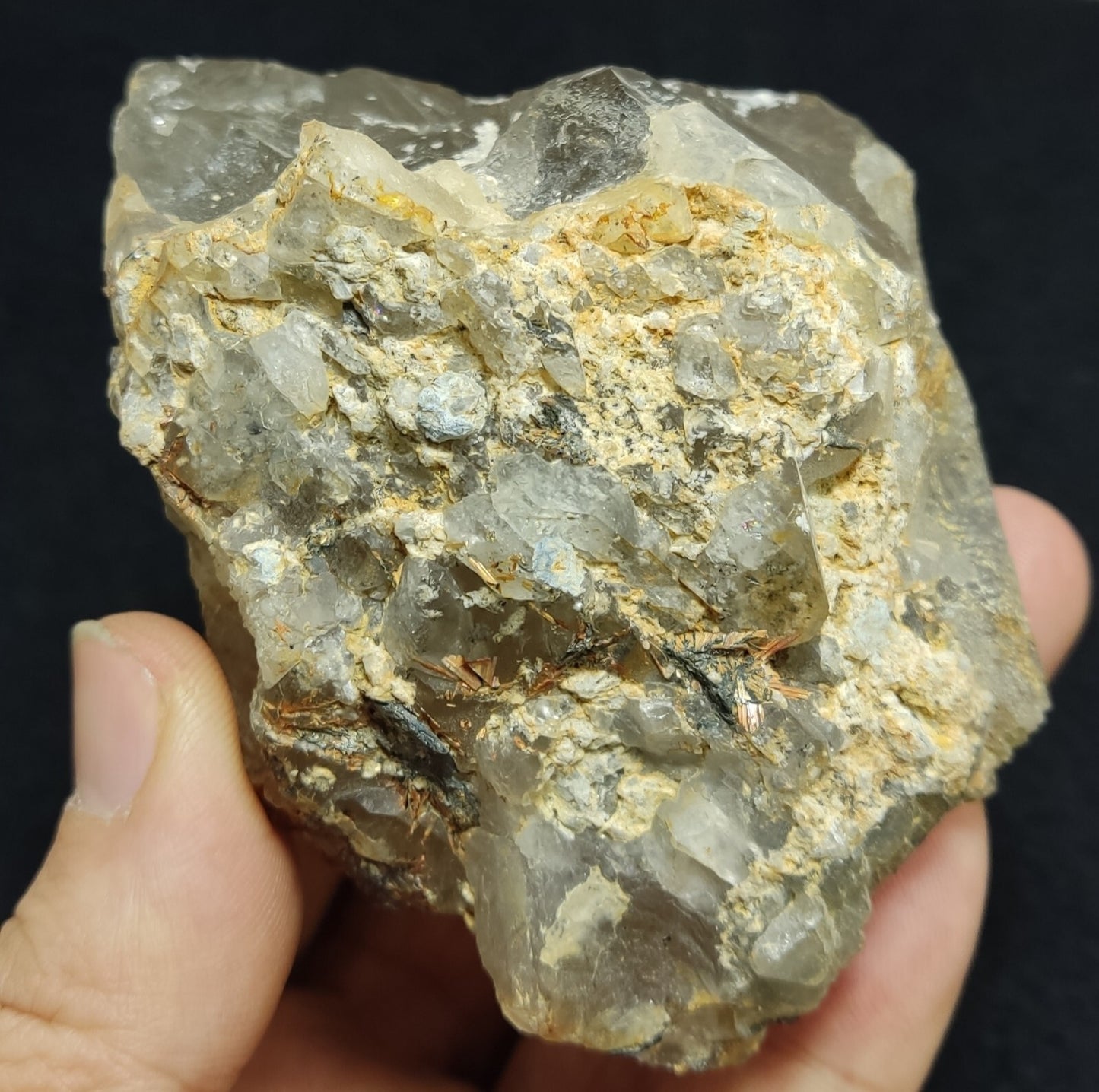 An Aesthetic terminated Quartz floater with rutiles and hematite 399 grams