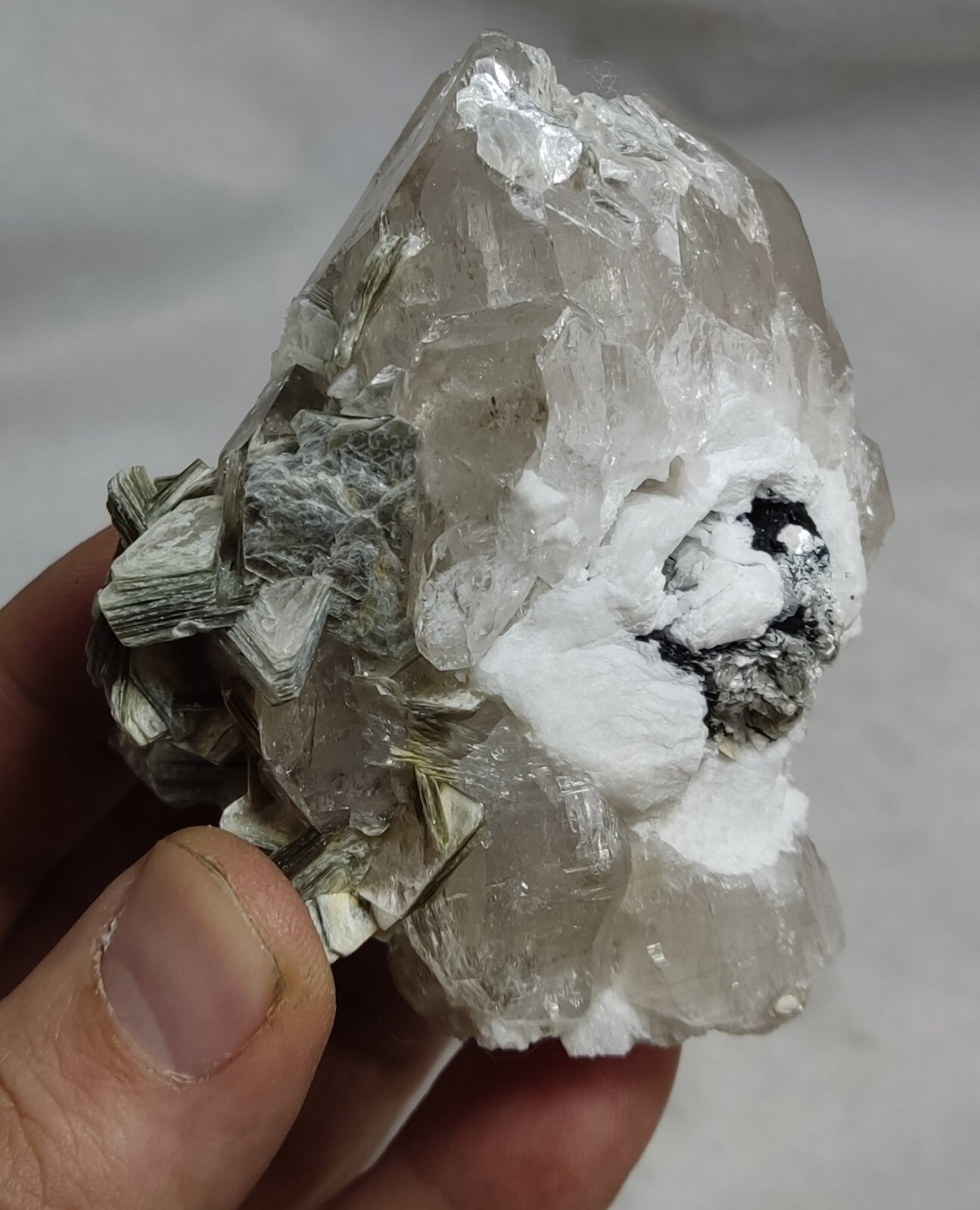 An amazing specimen of quartz with muscovite and albite 260 grams