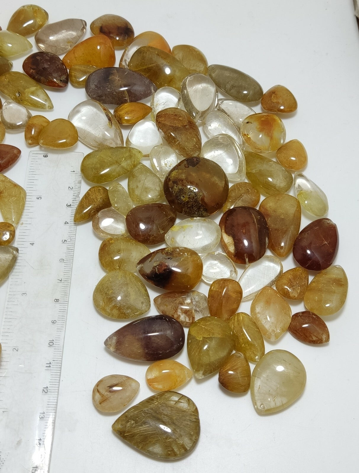 780 grams Rutilated polished quartz tumbles-cabochons