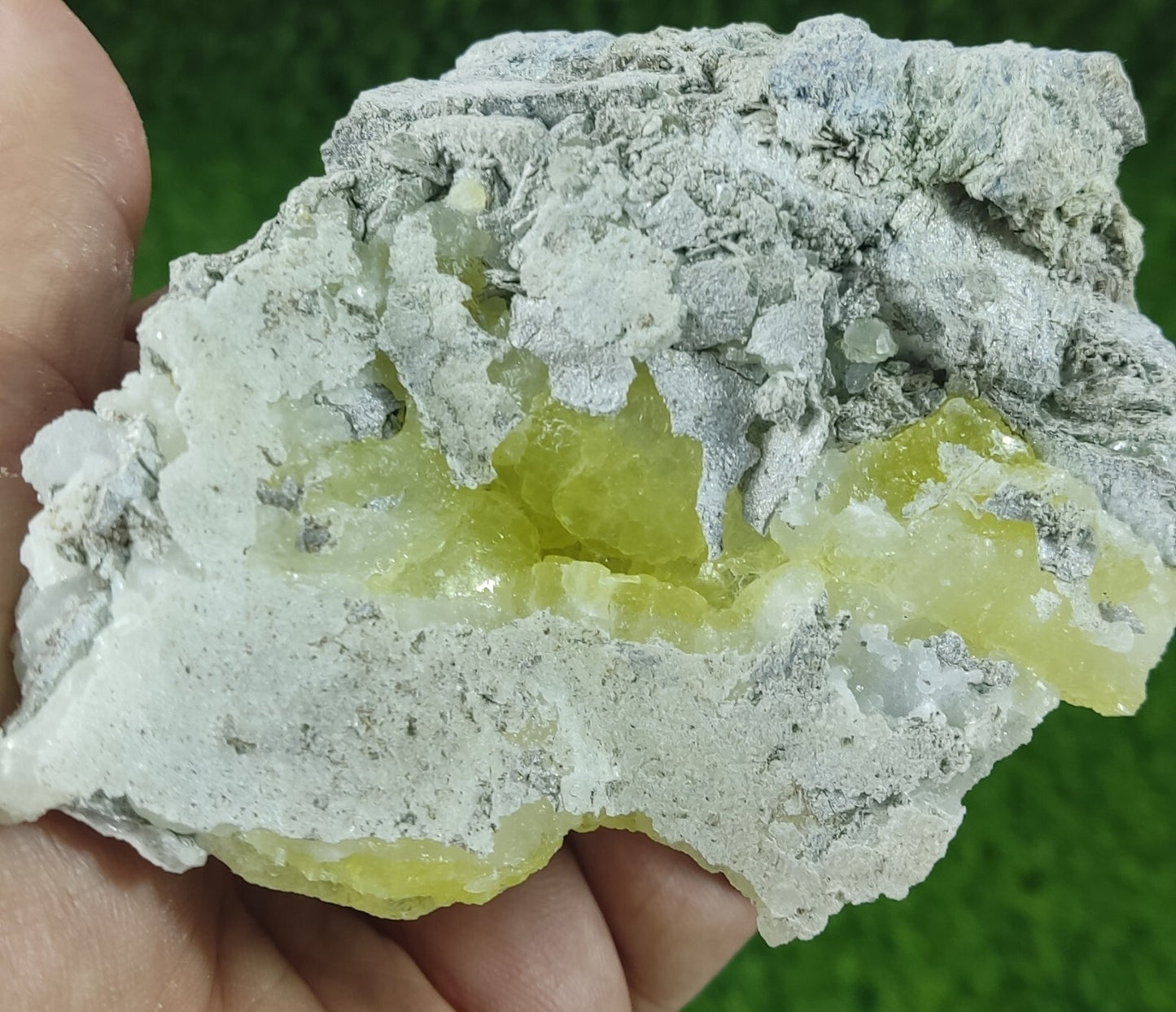 175 grams yellow color brucite specimen with Chromite