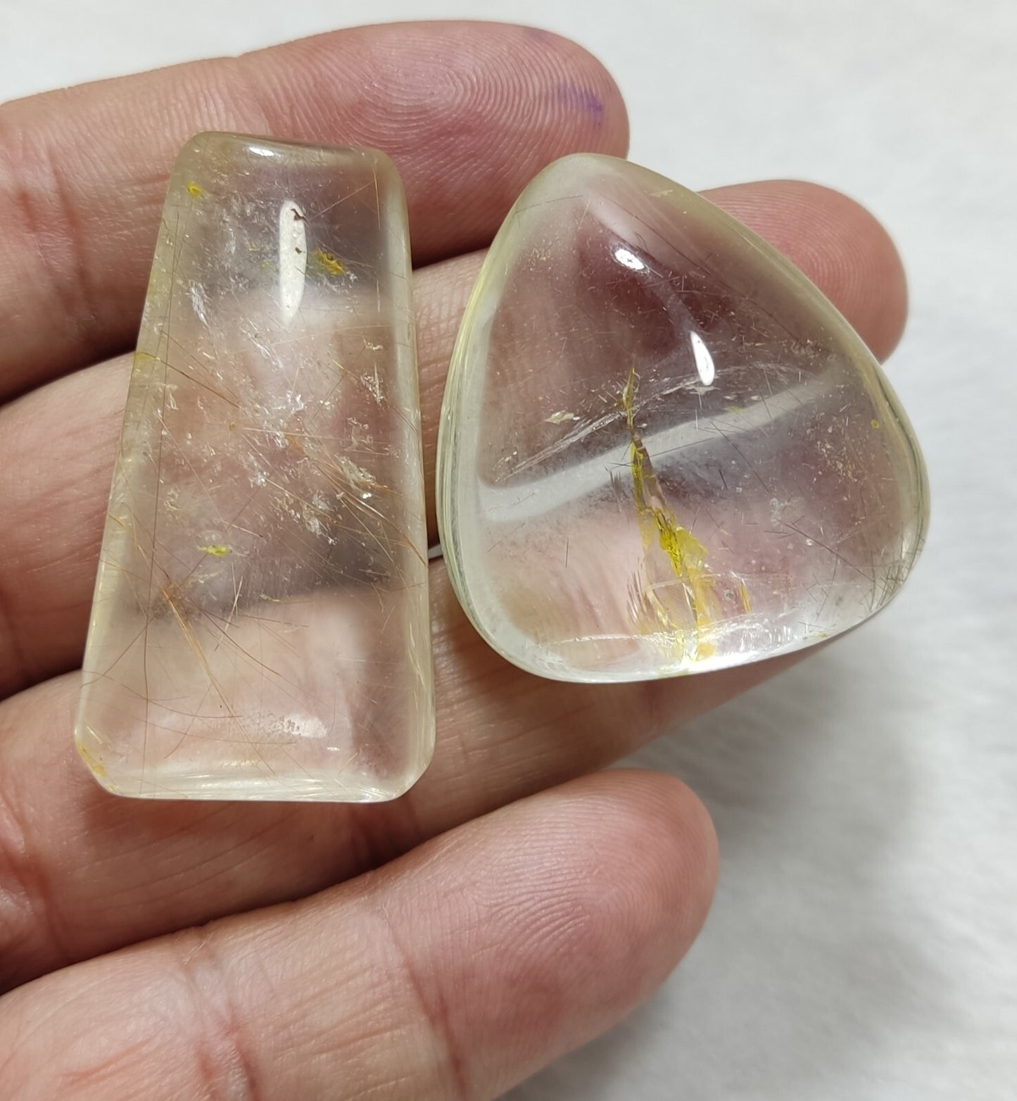 An amazing collection of 2 Rutilated polished quartz tumbles 46 grams