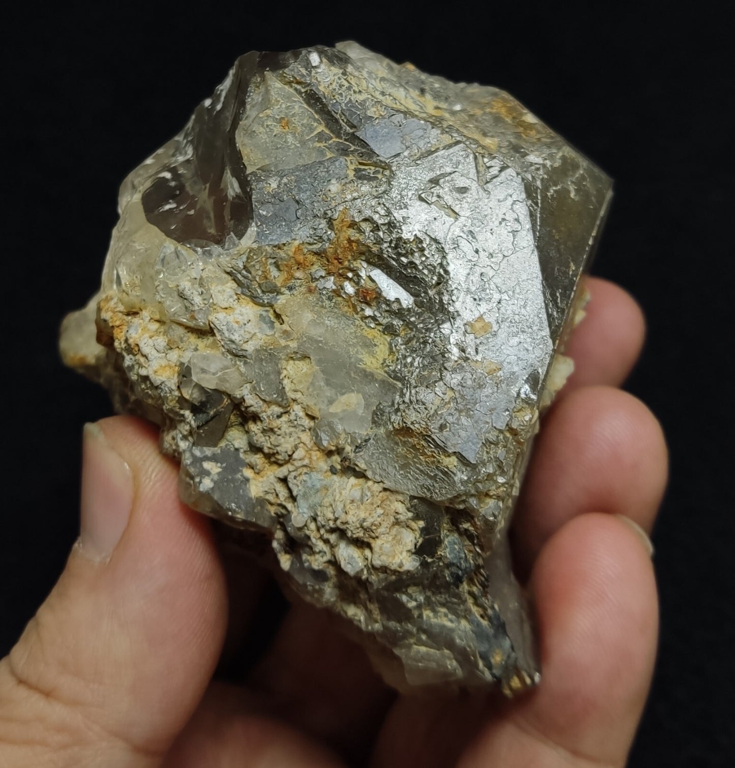 An Aesthetic terminated Quartz floater with rutiles and hematite 399 grams