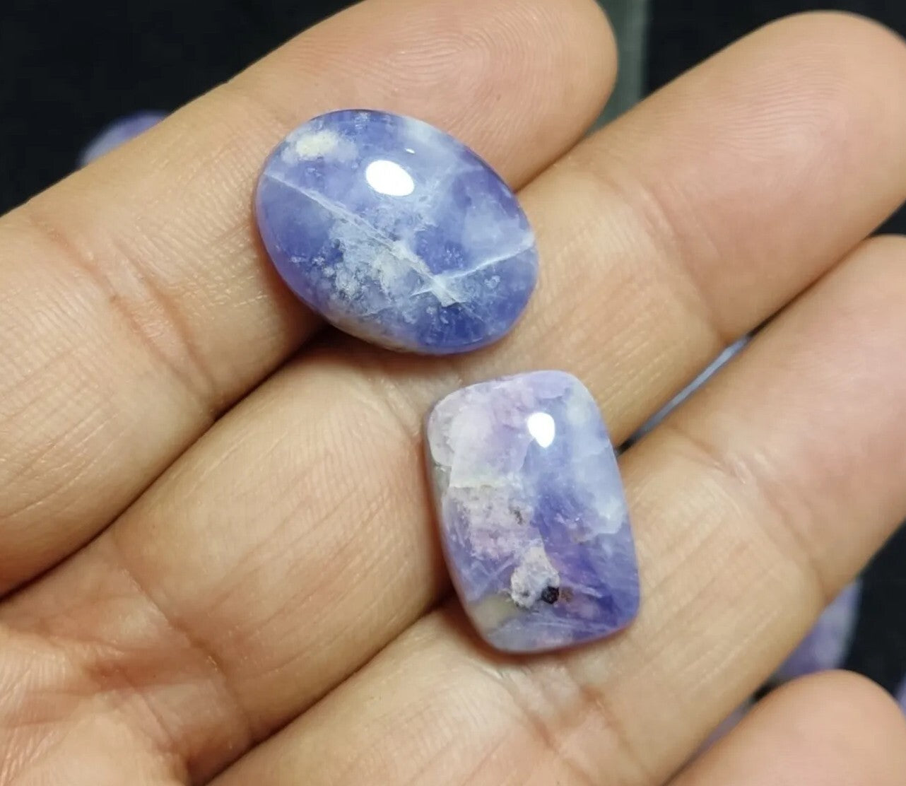 17 pieces Hackmanite cabochons  fluorescent collective weight 350 carats