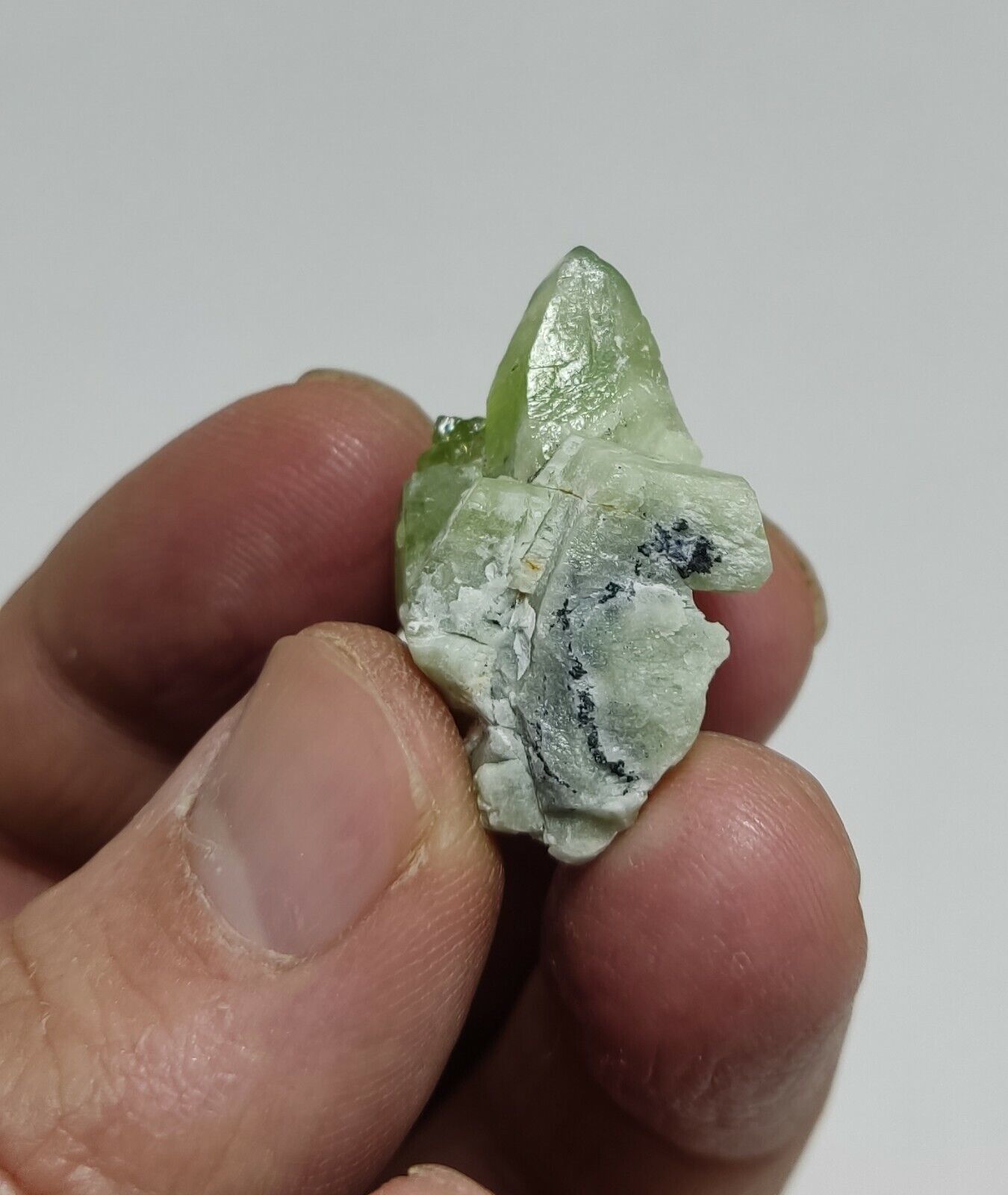 A aesthetic naturally terminated peridot crystal specimen 12 grams