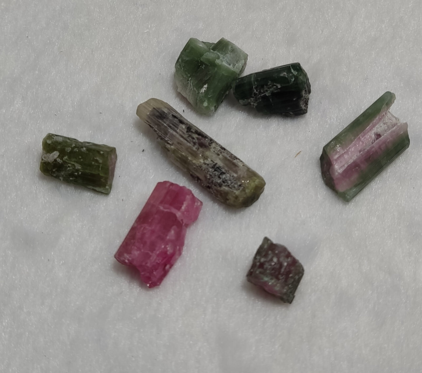 23 grams, 7 tourmaline crystals