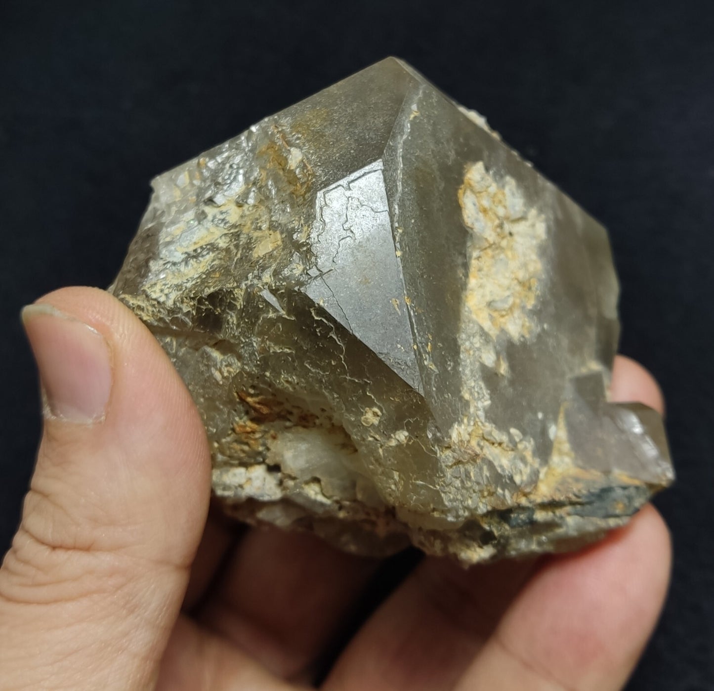 An Aesthetic terminated Quartz floater with rutiles and hematite 399 grams