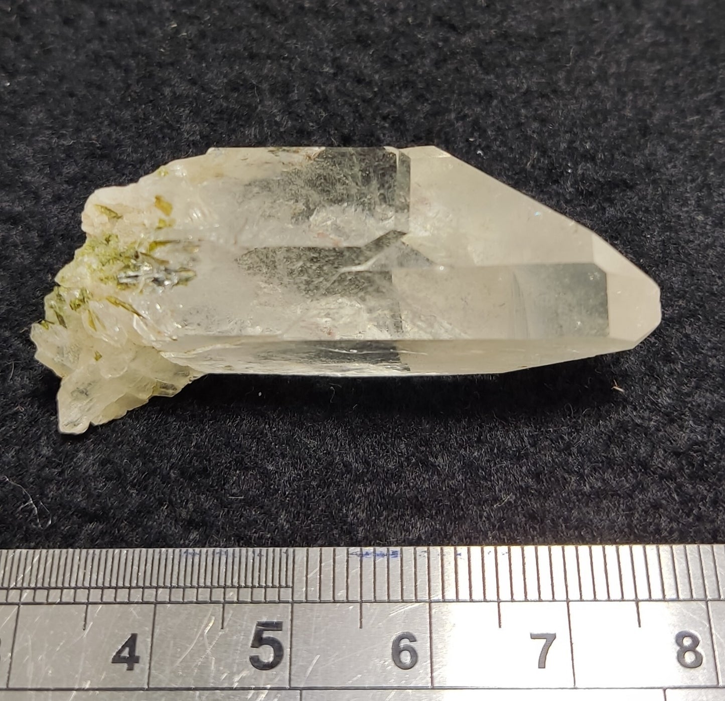 An Aesthetic terminated clear quartz with some epidote inclusions 20 grams