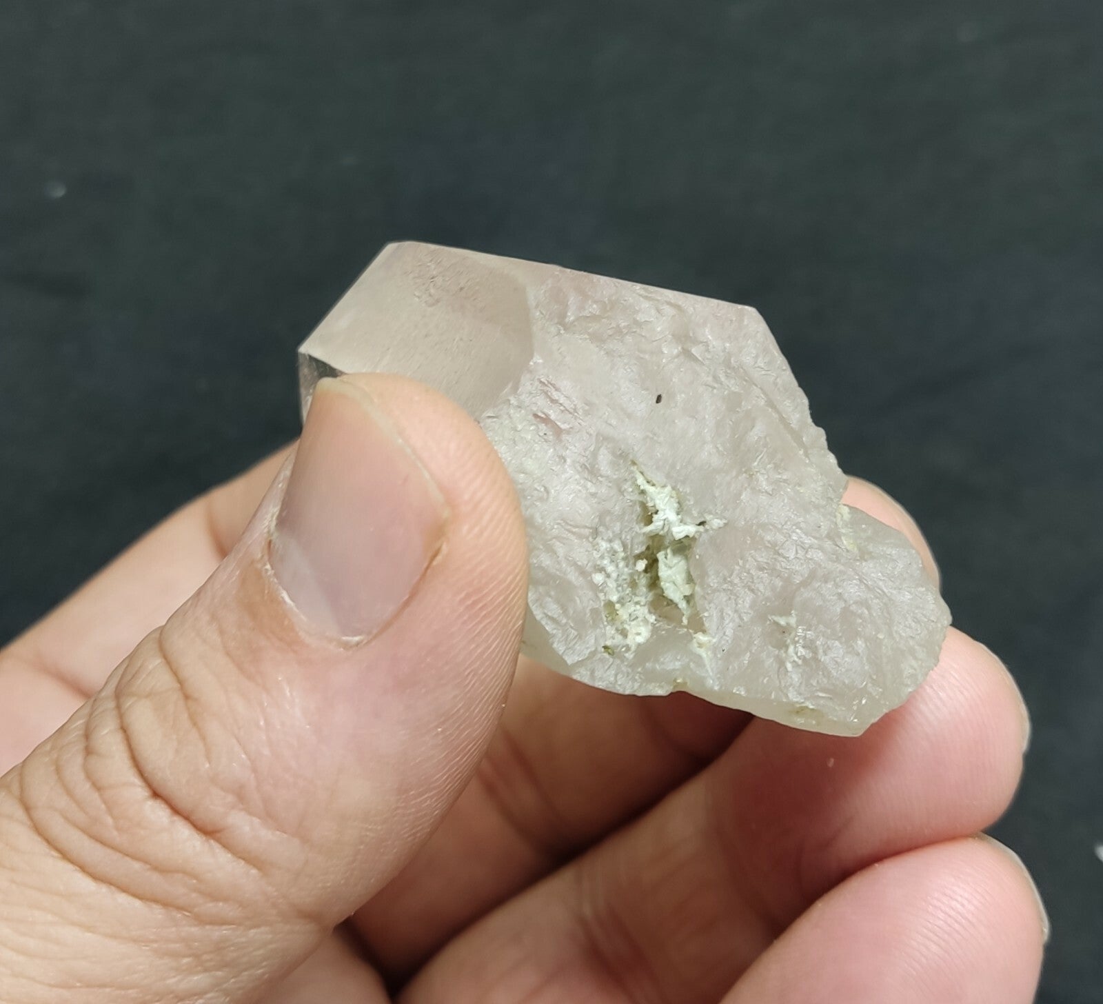 An amazing specimen of terminated Quartz crystal with unique inclusions 67 grams