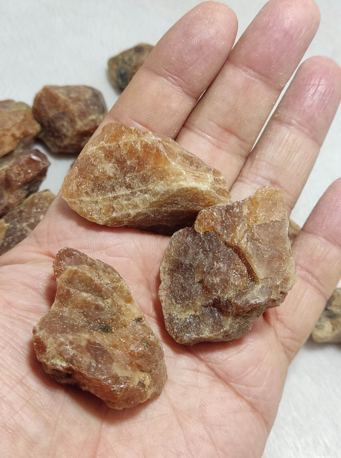 900 grams lot of rough hessonite garnets