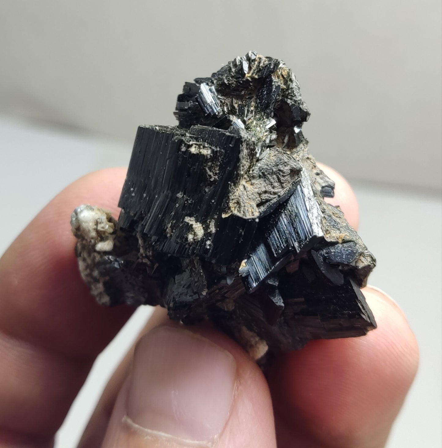 An aesthetic specimen of terminated aegirine crystal cluster 25 grams