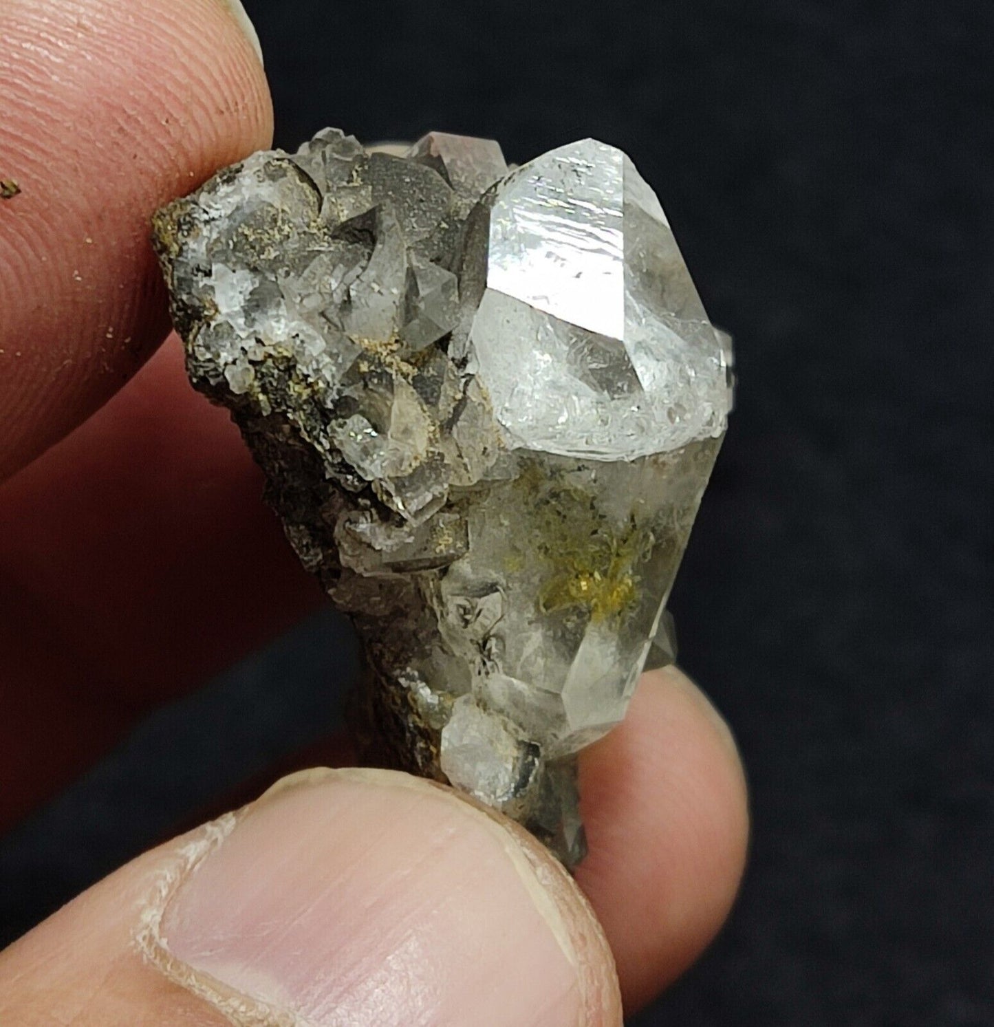 An Aesthetic quartz/calcite crystal specimen with petroleum inclusions 15 grams