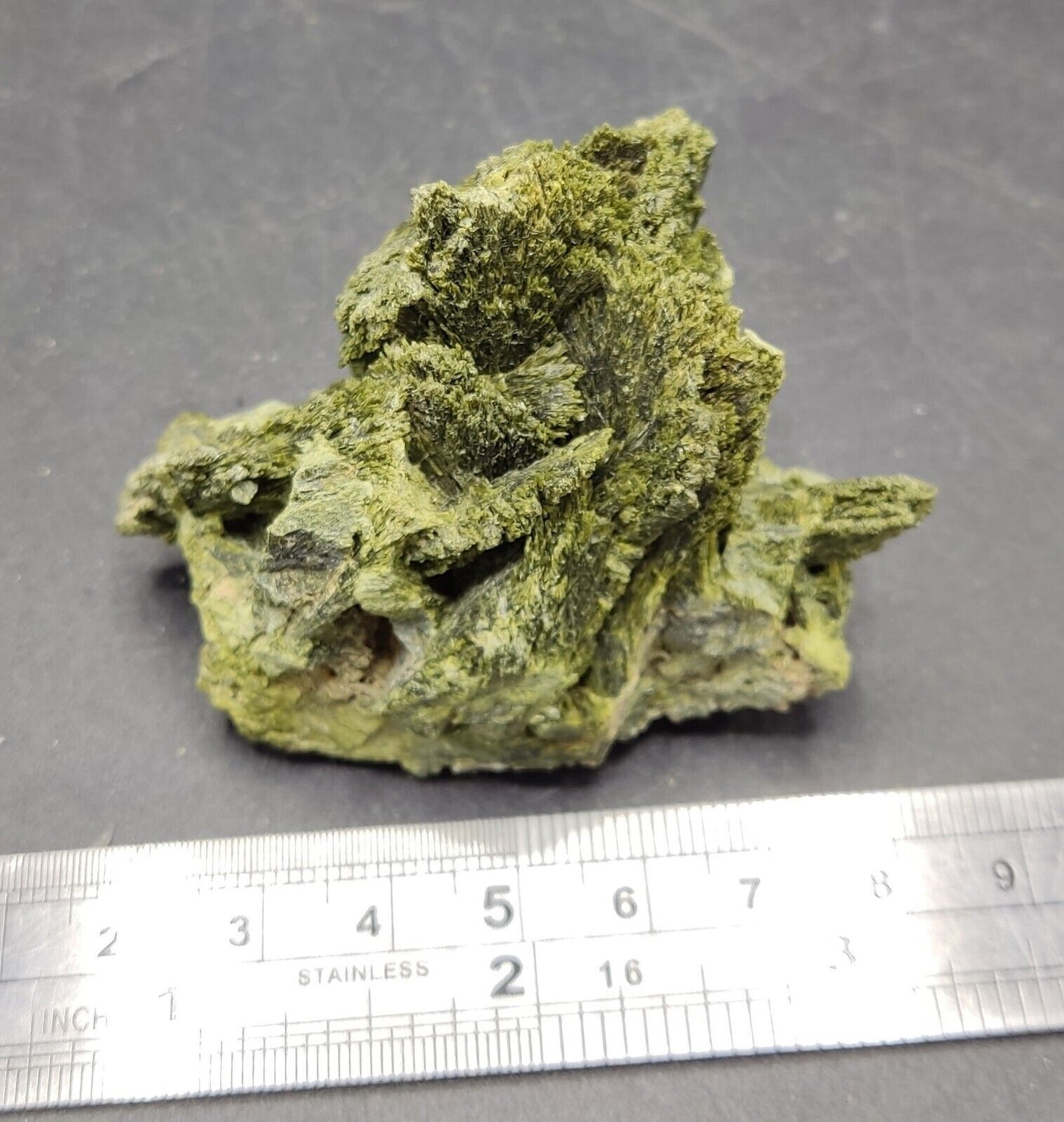 An aesthetic specimen of epidote crystal spray type 107 grams