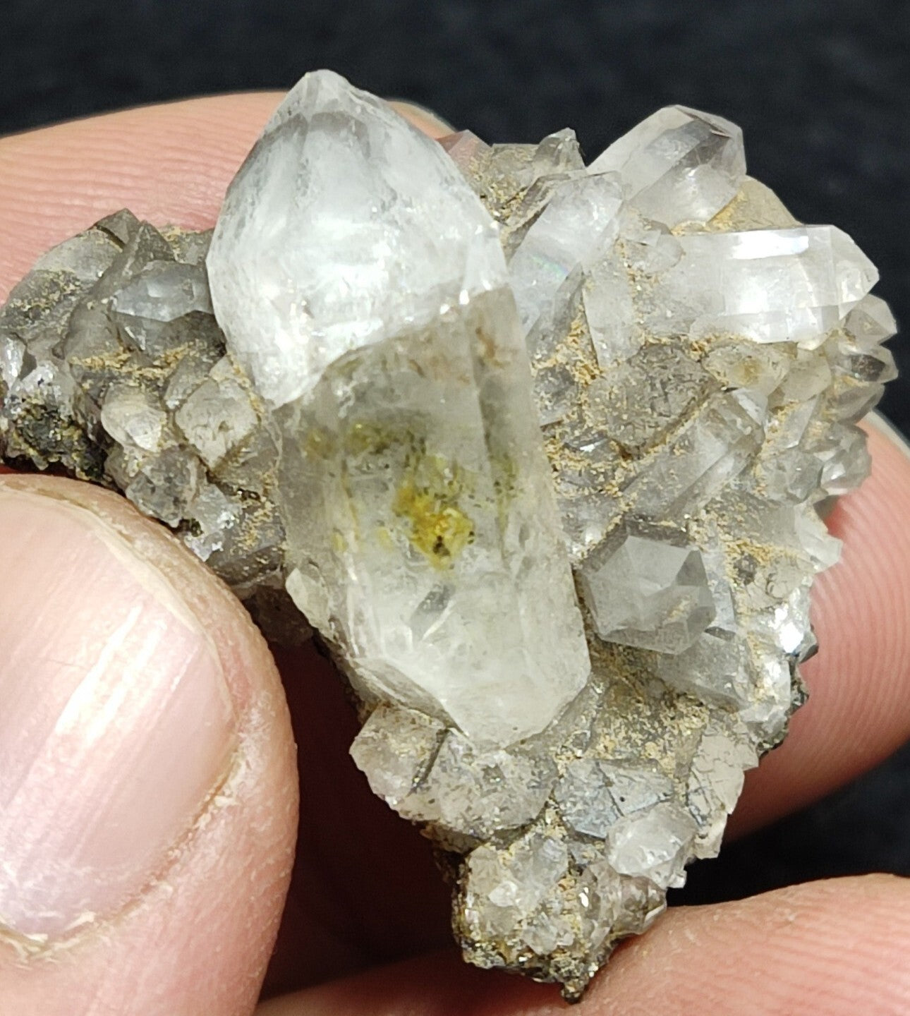 An Aesthetic quartz/calcite crystal specimen with petroleum inclusions 15 grams