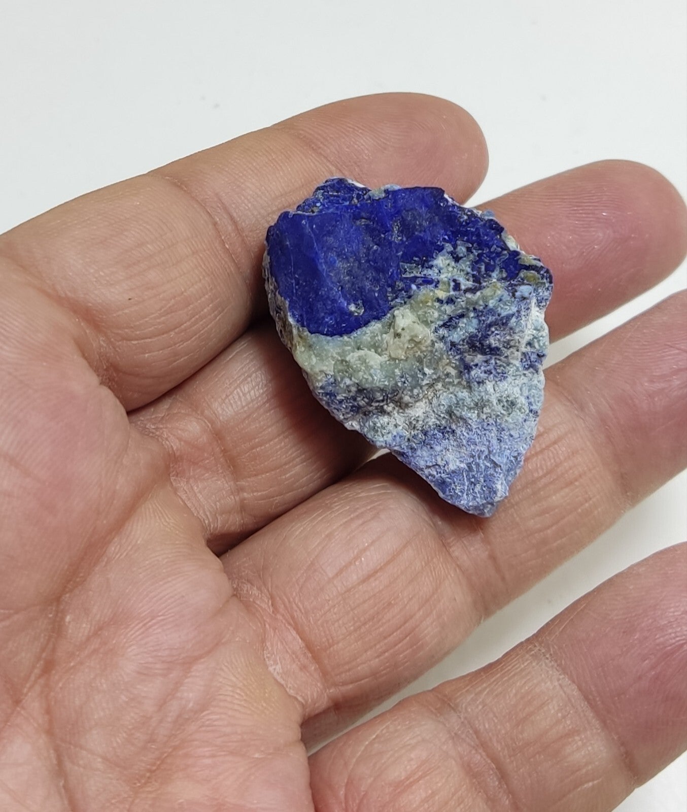 An Aesthetic specimen of fluorescent Lazurite with pyrite 25 grams