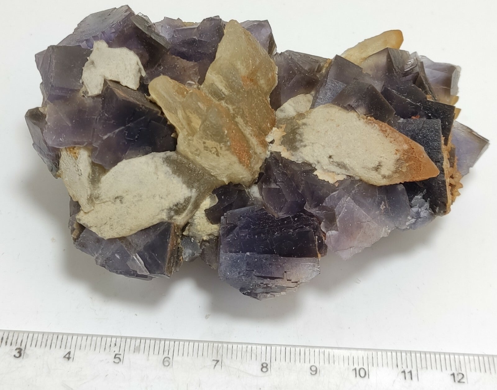 An amazing specimen of cubic purplish color Fluorite with calcite 263 grams