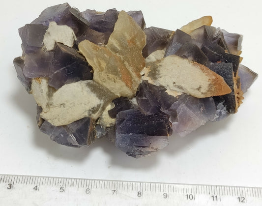 An amazing specimen of cubic purplish color Fluorite with calcite 263 grams