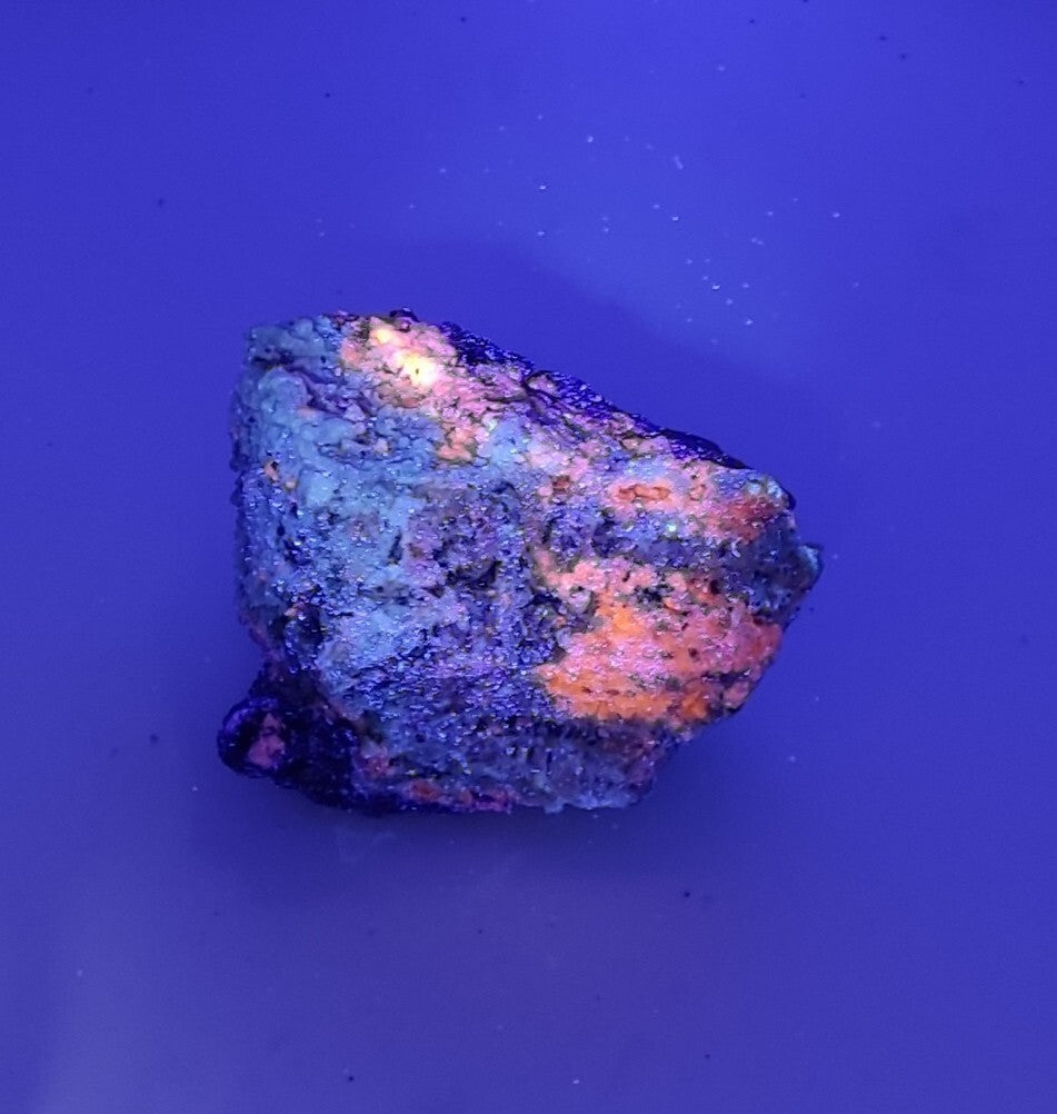 An Aesthetic specimen of fluorescent Lazurite with pyrite 181 grams