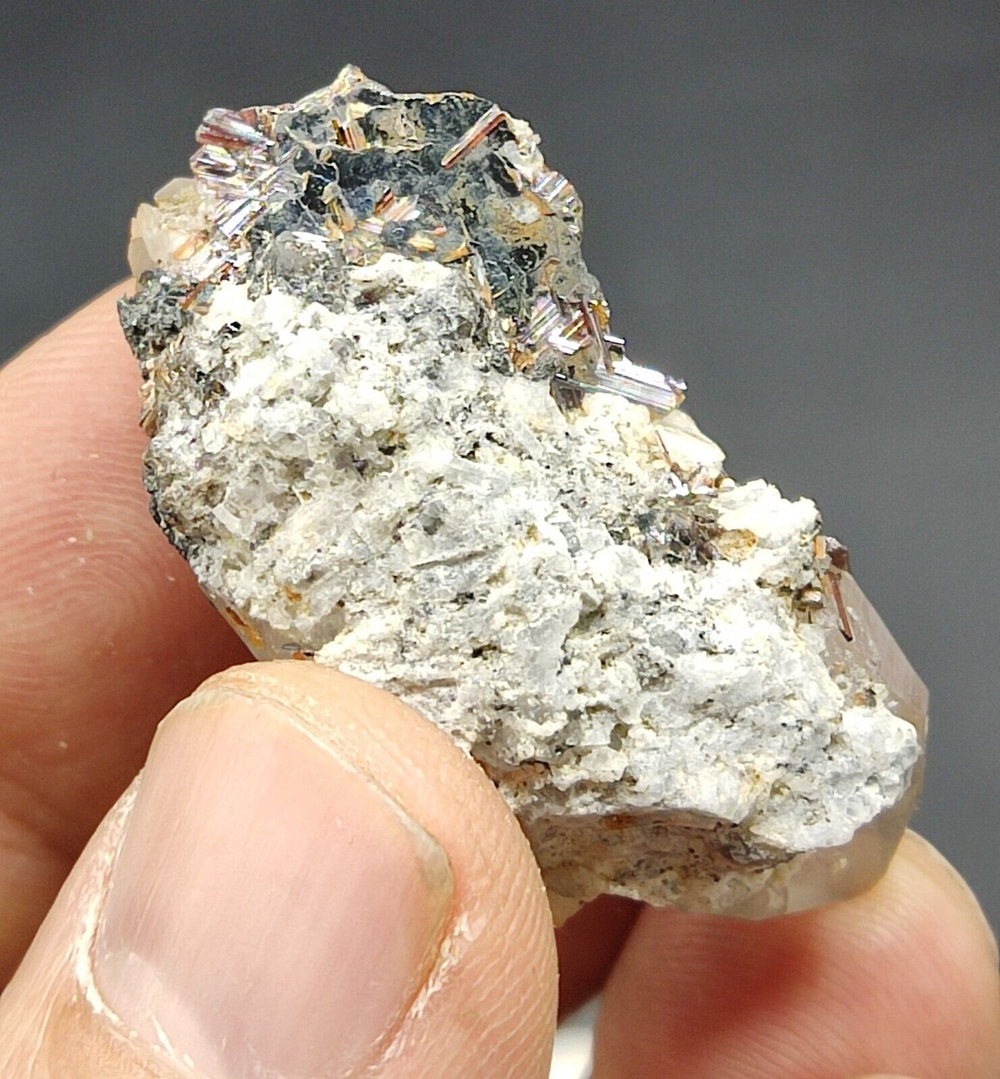 An Aesthetic specimen of quartz crystal with hematite and saginite 16 grams