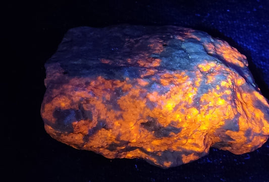 An amazing specimen of fluorescent rough hackmanite chunk 440 grams