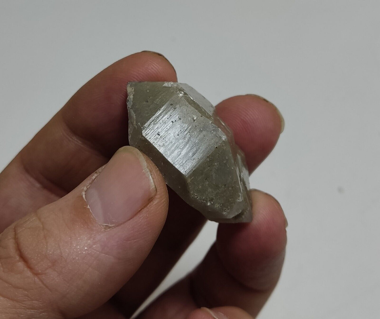 An aesthetic crystyof lodolite/chlorite Quartz 24 grams
