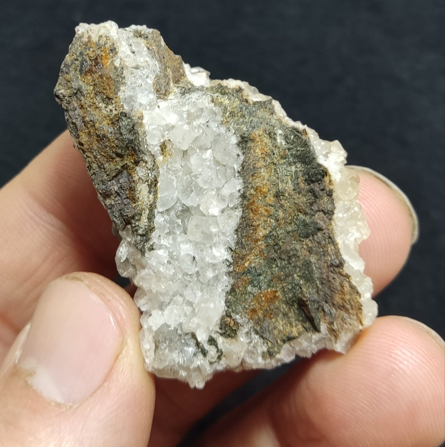 An Aesthetic quartz/calcite crystal specimen with petroleum inclusions 23 grams