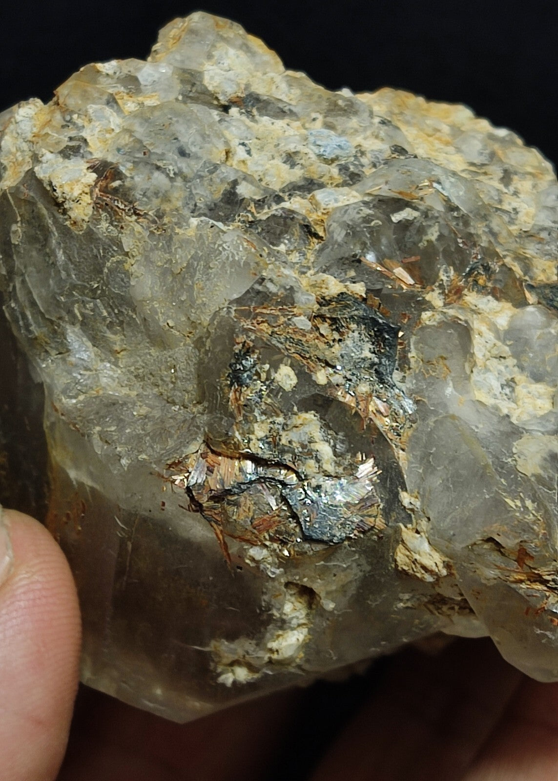 An Aesthetic terminated Quartz floater with rutiles and hematite 399 grams