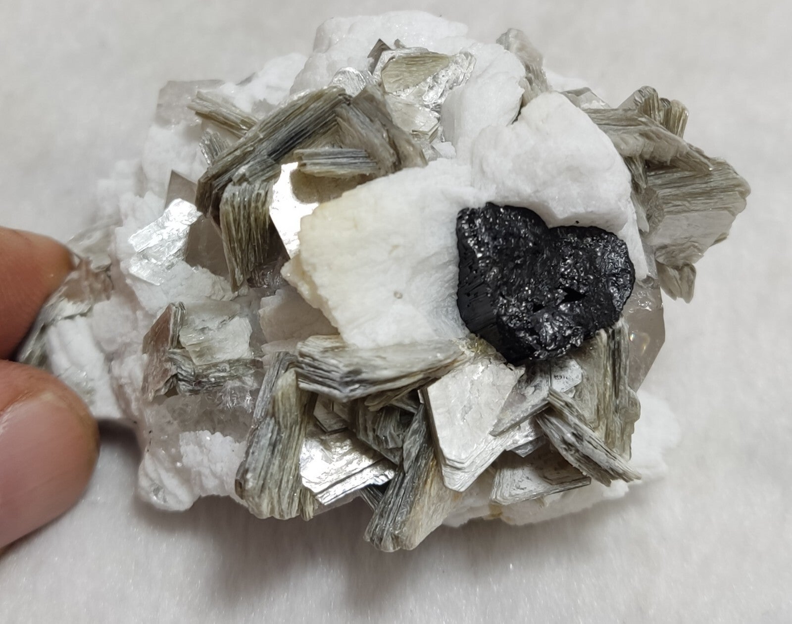 An amazing specimen of quartz with muscovite and albite 134 grams