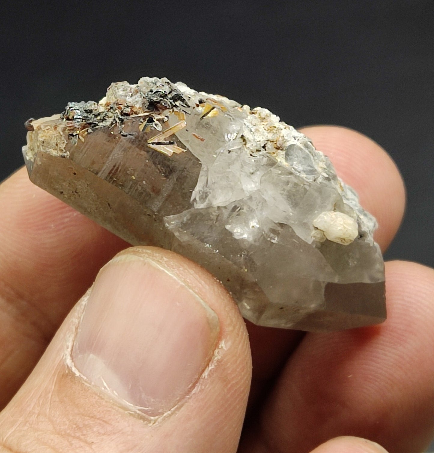 An Aesthetic specimen of quartz crystal with hematite and saginite 16 grams