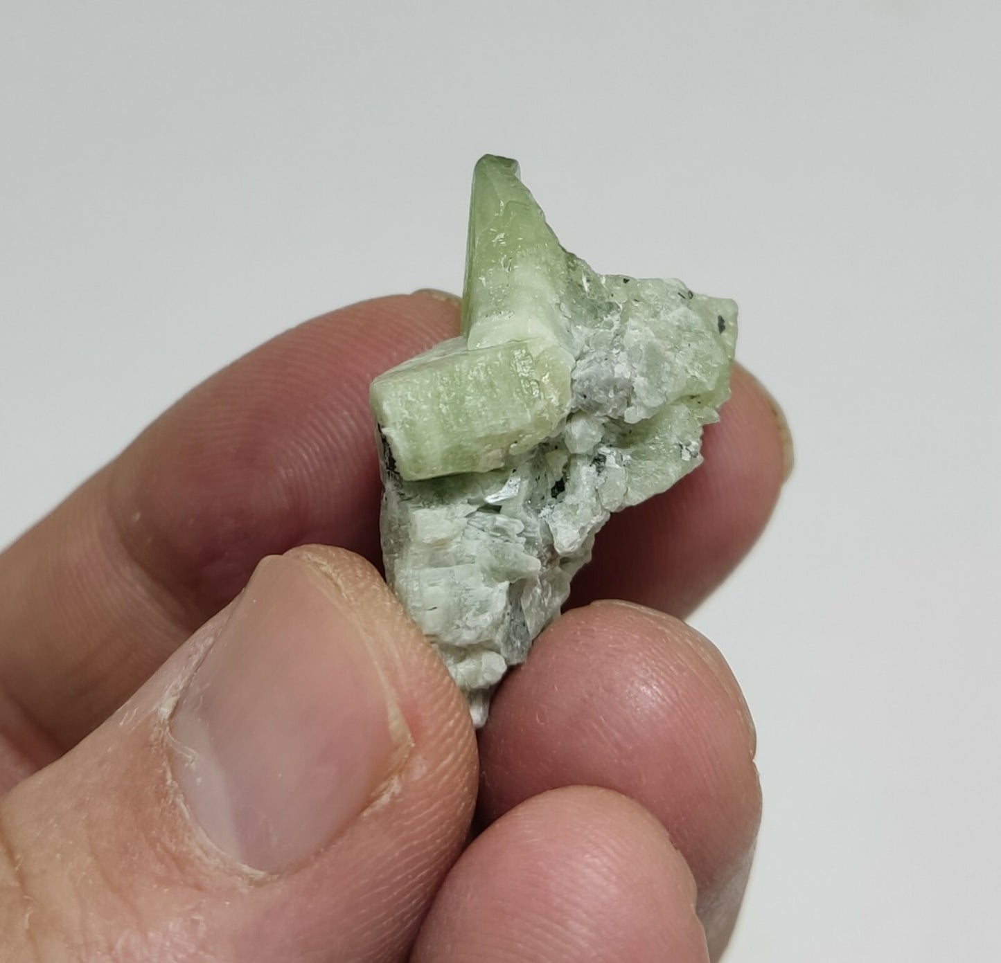 A aesthetic naturally terminated peridot crystal specimen 12 grams