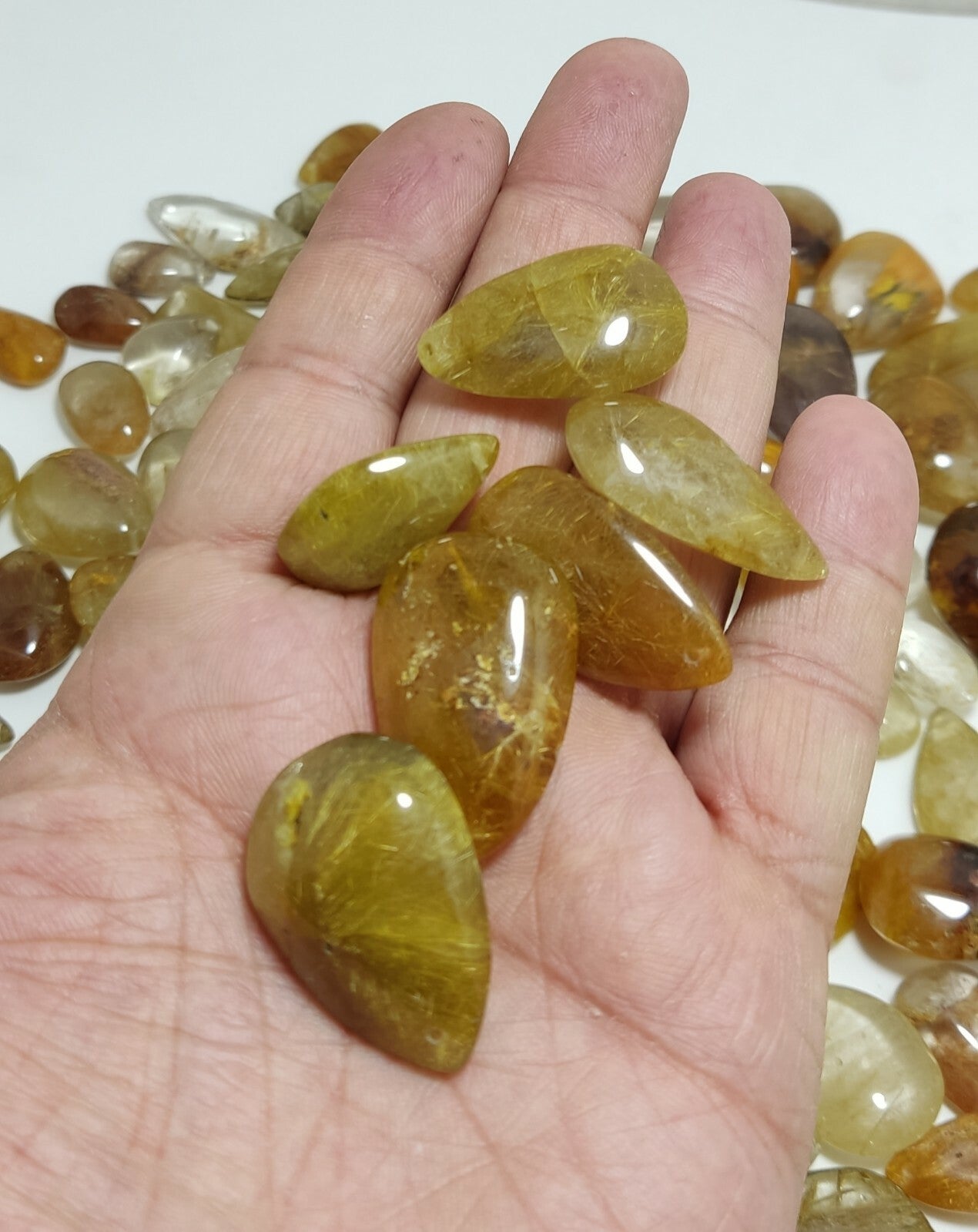 780 grams Rutilated polished quartz tumbles-cabochons