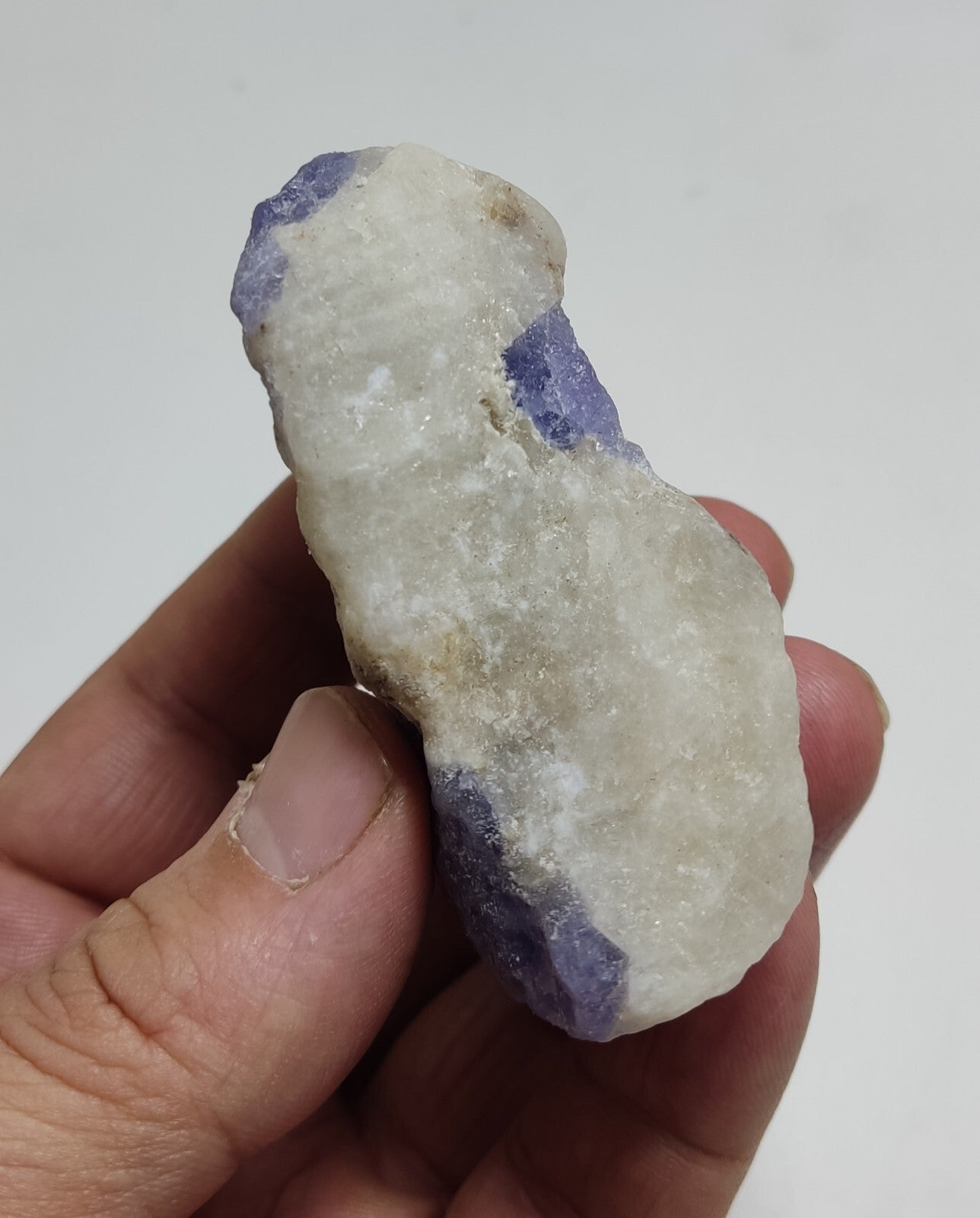 An amazing specimen of hackmanite highly Tenebrescent 124 grams