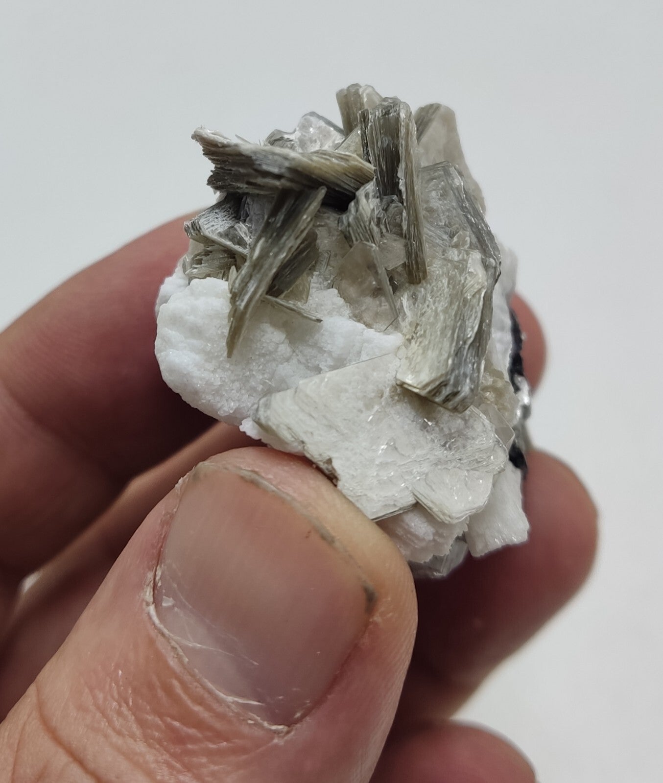 An Aesthetic specimen of muscovite with quartz, Tourmaline and albite 49 grams