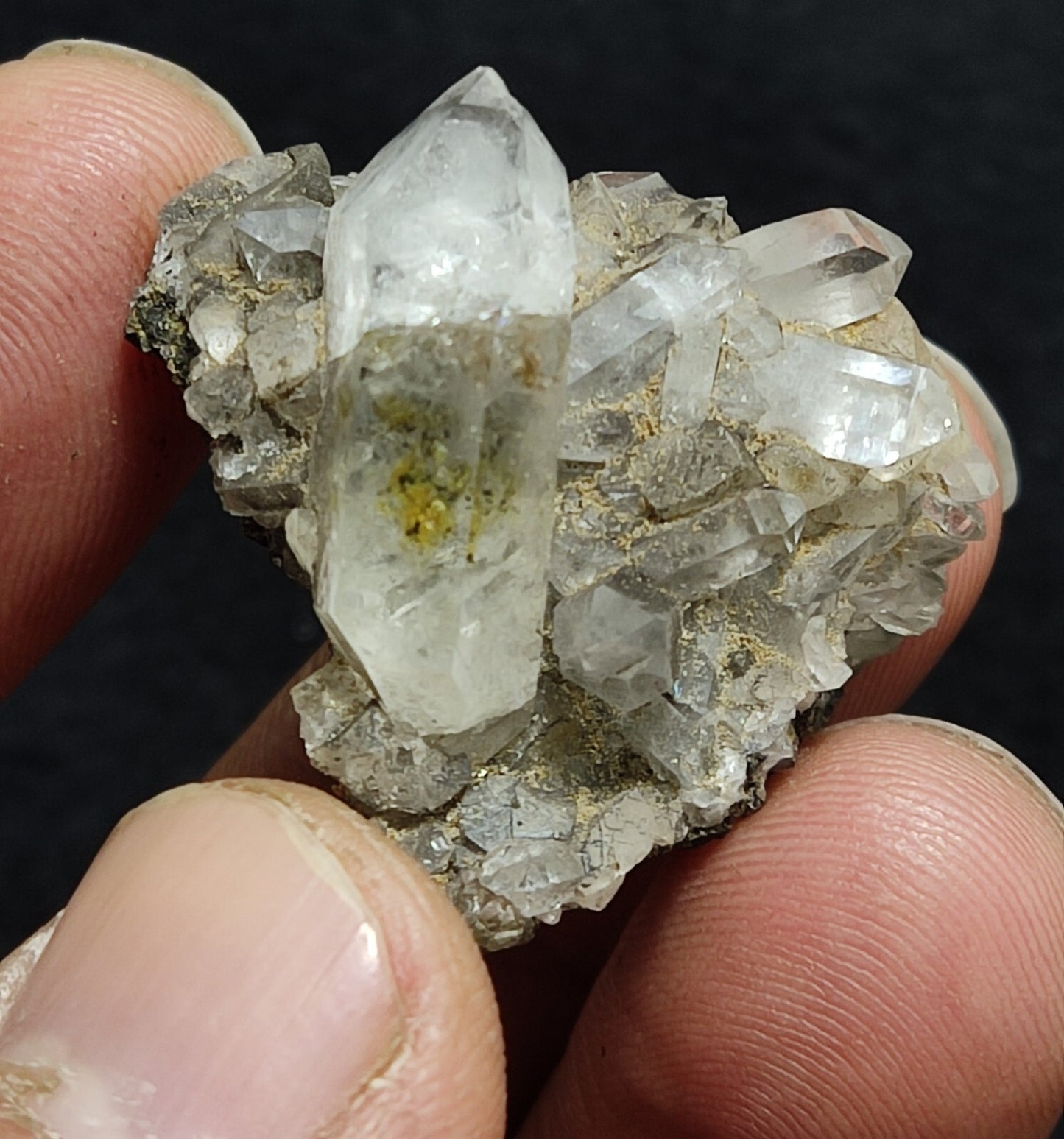 An Aesthetic quartz/calcite crystal specimen with petroleum inclusions 15 grams