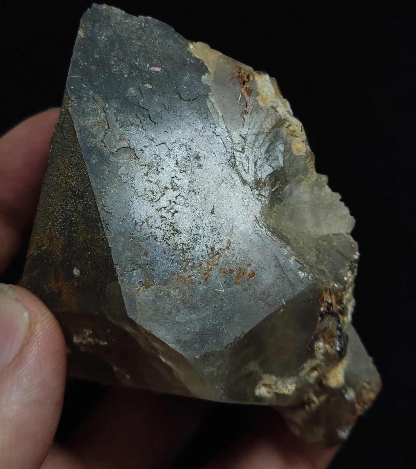 An Aesthetic terminated Quartz floater with rutiles and hematite 399 grams