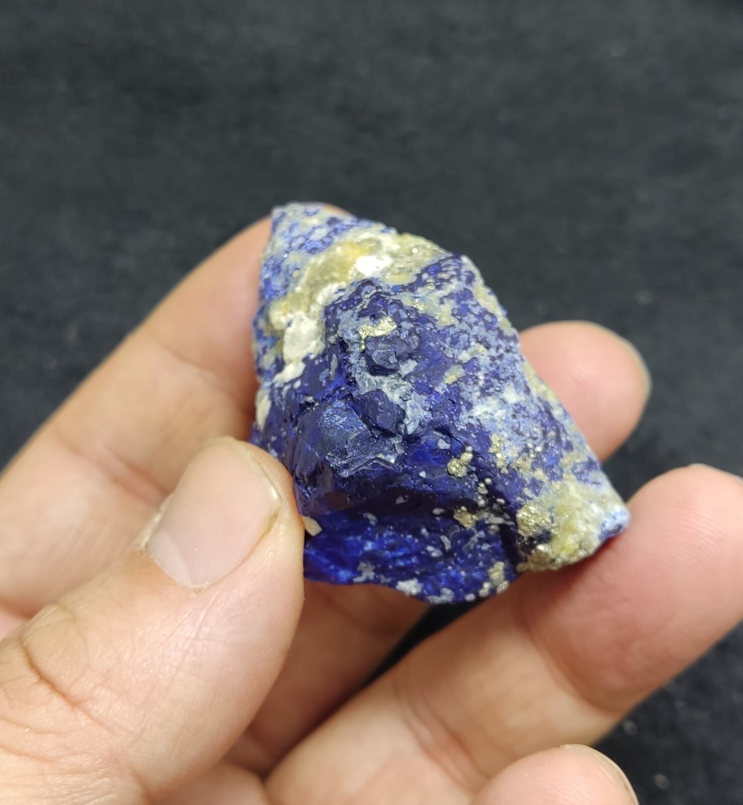 An Aesthetic specimen of fluorescent Lazurite with pyrite 65 grams