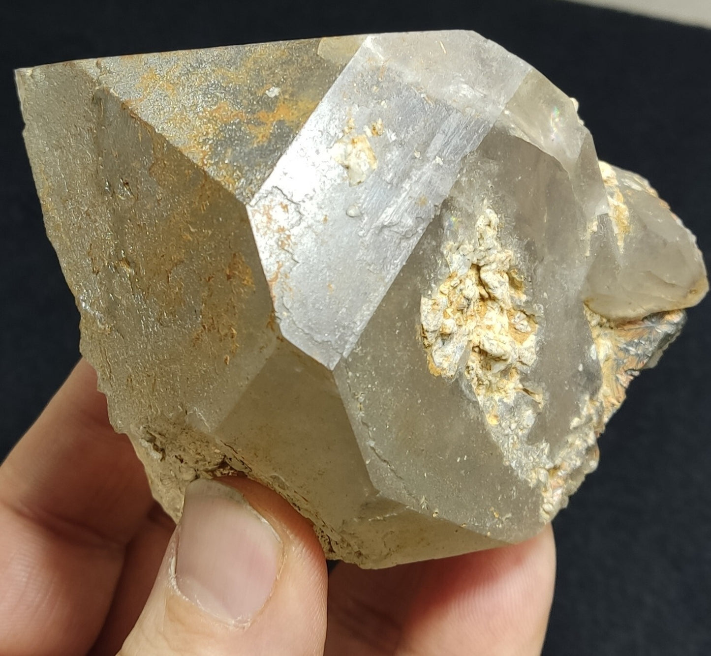 An Aesthetic terminated Quartz floater with rutiles and hematite 399 grams