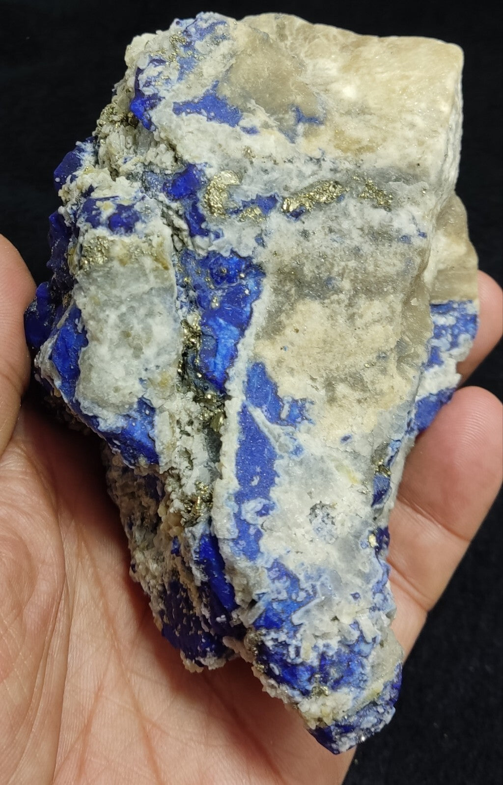 An Aesthetic specimen of fluorescent Lazurite with pyrite 489 grams