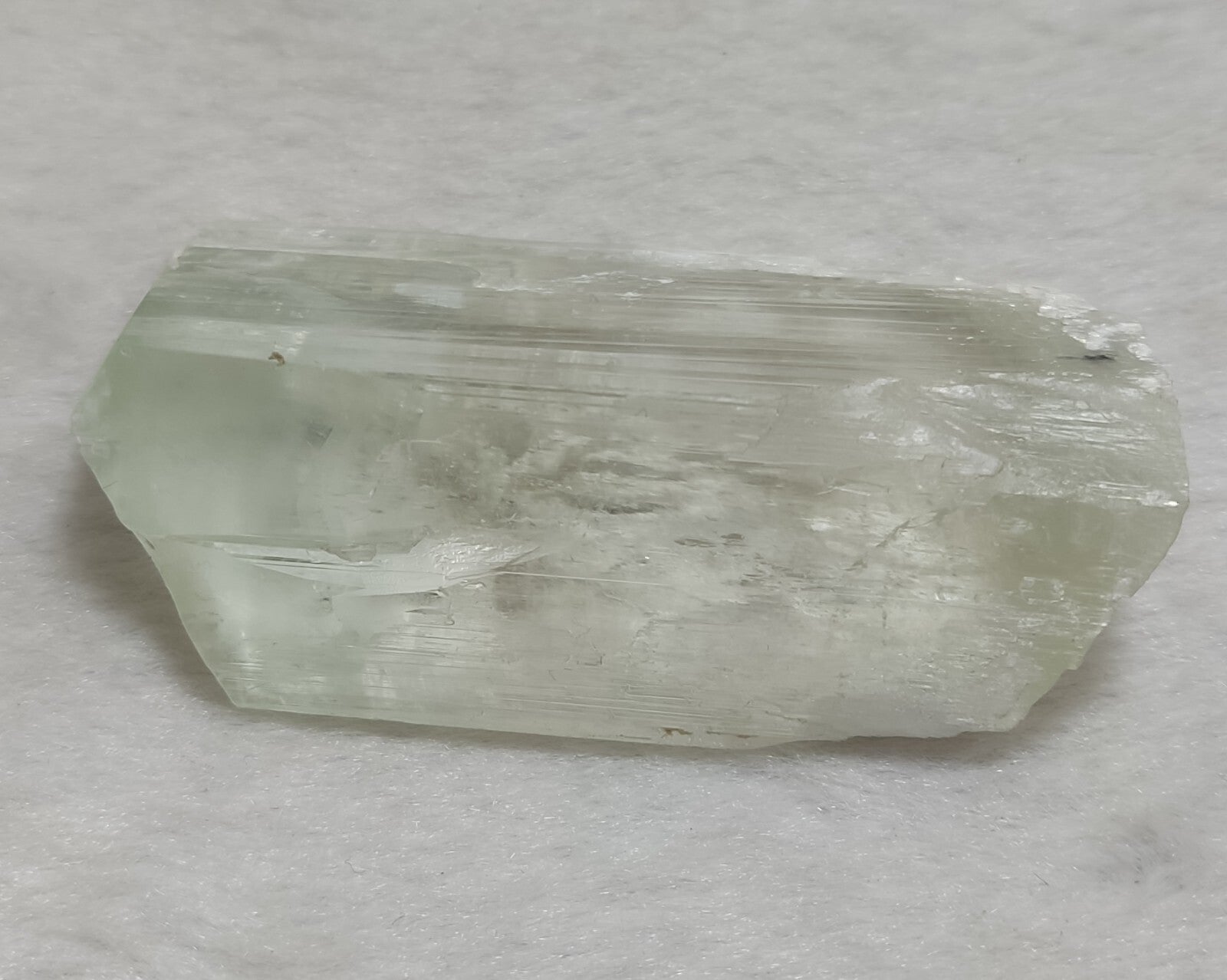 An Aesthetic terminated spodumene floater crystal specimen 75 grams