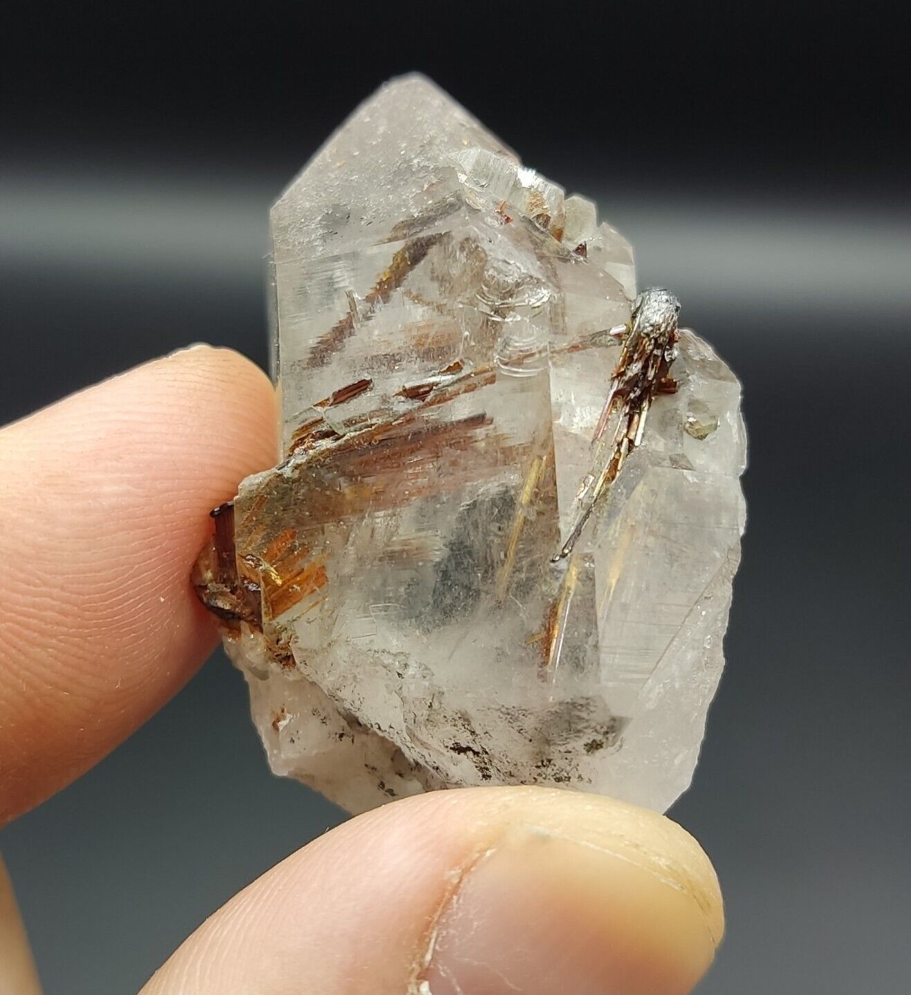 An aesthetic specimen of quartz with hematite and rutile inclusions 28 grams