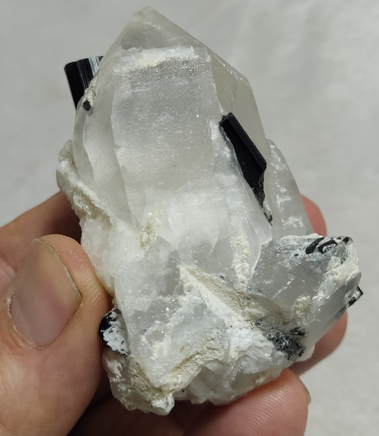 Natural quartz crystal with black tourmaline 145 grams
