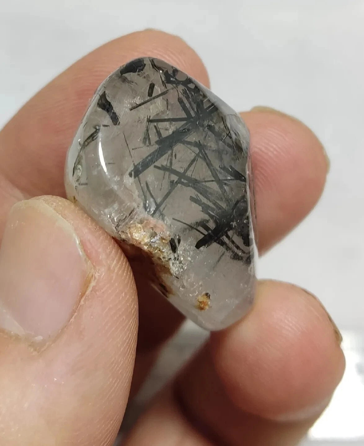 Rutiles/aegirine/ Unconfirmed quartz polished tumble 75 carats