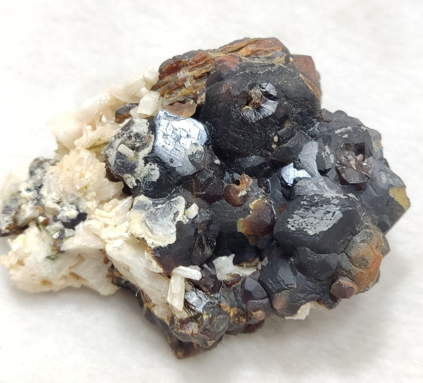 An Aesthetic specimen of andradite garnets on matrix 120 grams