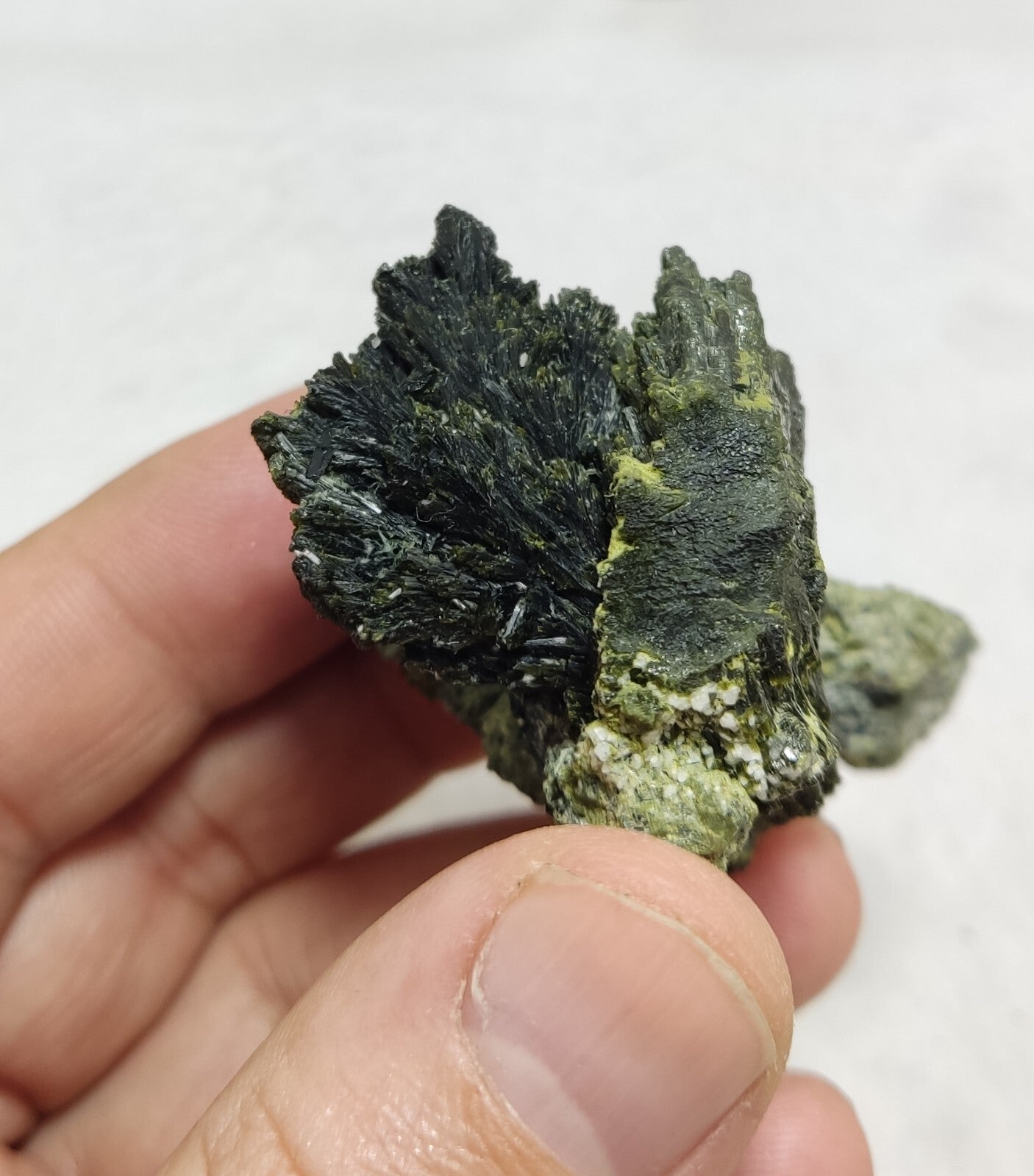An aesthetic specimen of epidote crystal spray type 66 grams