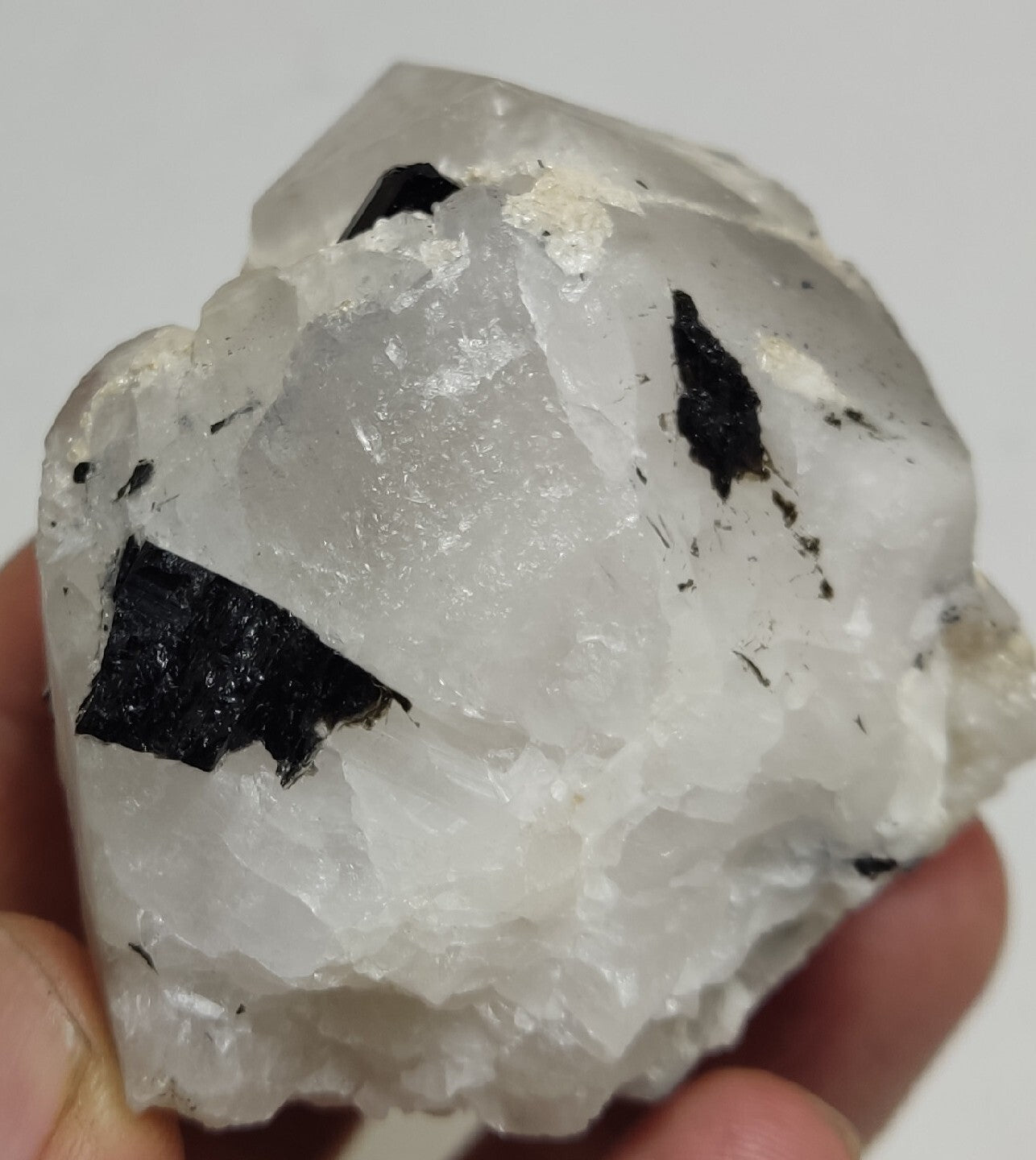 Natural quartz crystal with black tourmaline 129 grams