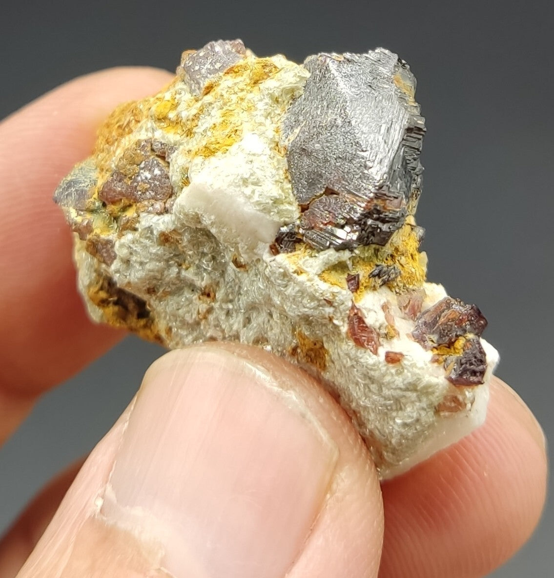 An aesthetic specimen of spessartine garnets on albite/feldspar 15 grams